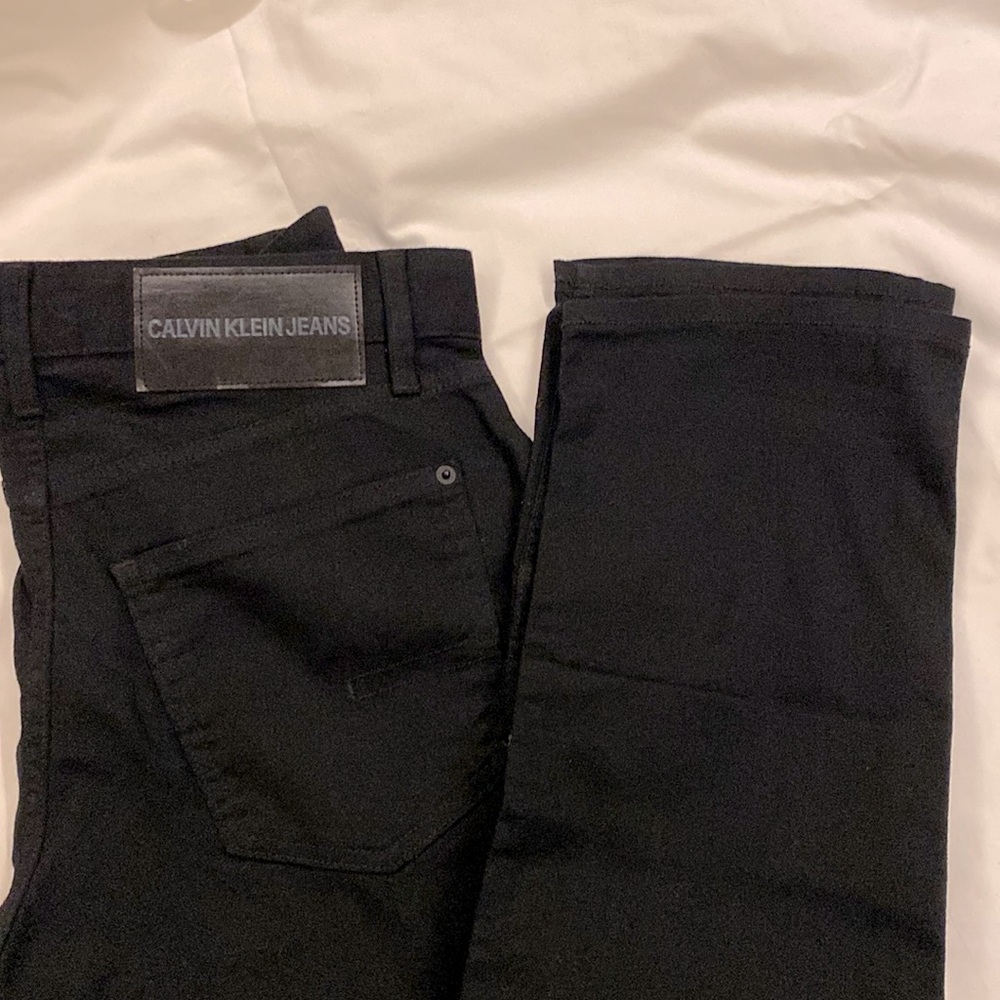 Black Calvin Klein jeans